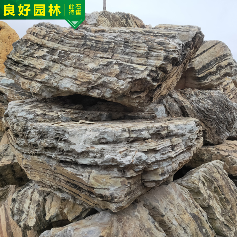 景观千层石假山 千层石驳岸 公园草地驳岸 千层石流水假山图片