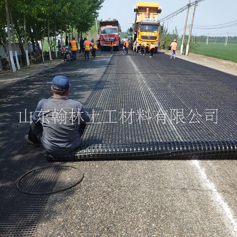 土工格柵廠家生產(chǎn)瀝青路面防裂玻纖格柵自粘雙向玻纖土工格柵