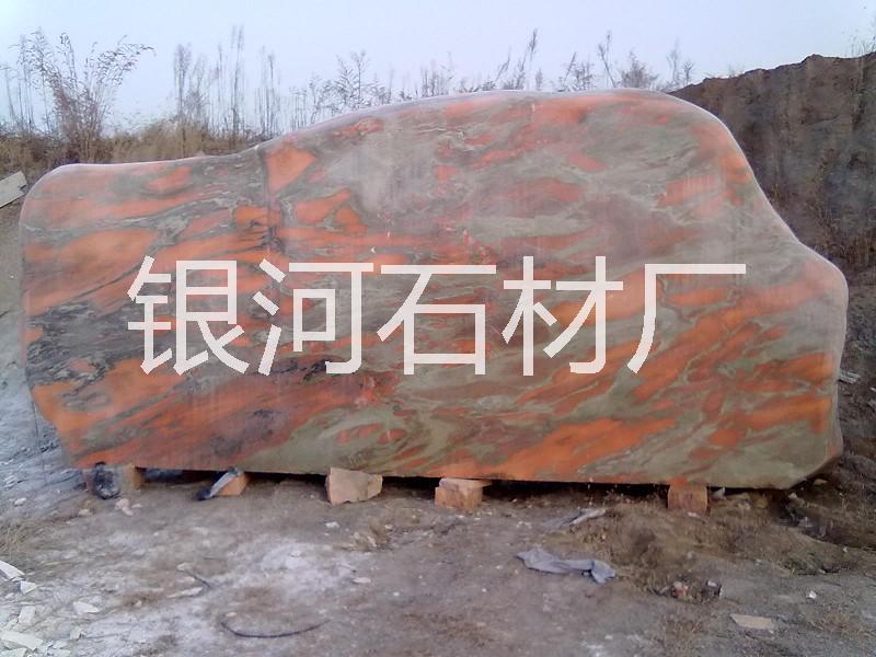 晚霞紅假山石頭圖片