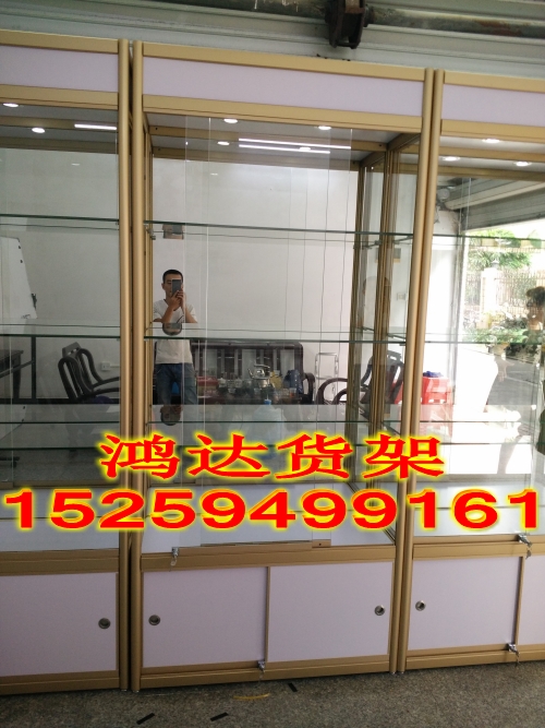 供應(yīng)泉州禮品旋轉(zhuǎn)展示柜酒店展示柜鈦合金展架玻璃展柜*貨架
