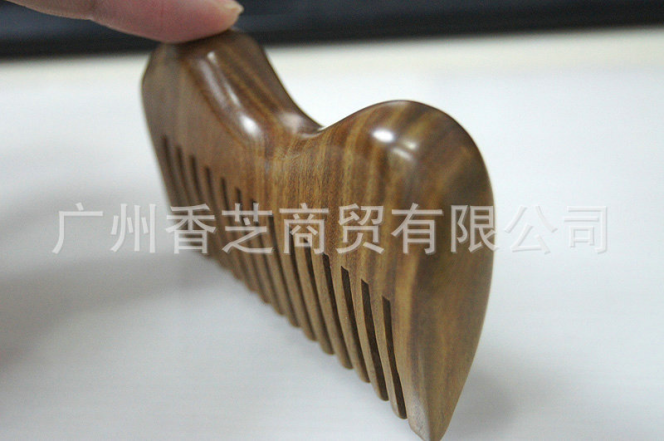臺(tái)灣*檀木木梳 促進(jìn)血液循環(huán)廠家  檀香木梳批發(fā)
