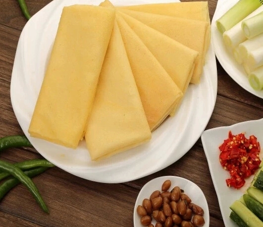 山東煎餅遠(yuǎn)近聞名離不開全自動煎餅機(jī) 煎餅機(jī)功不可沒