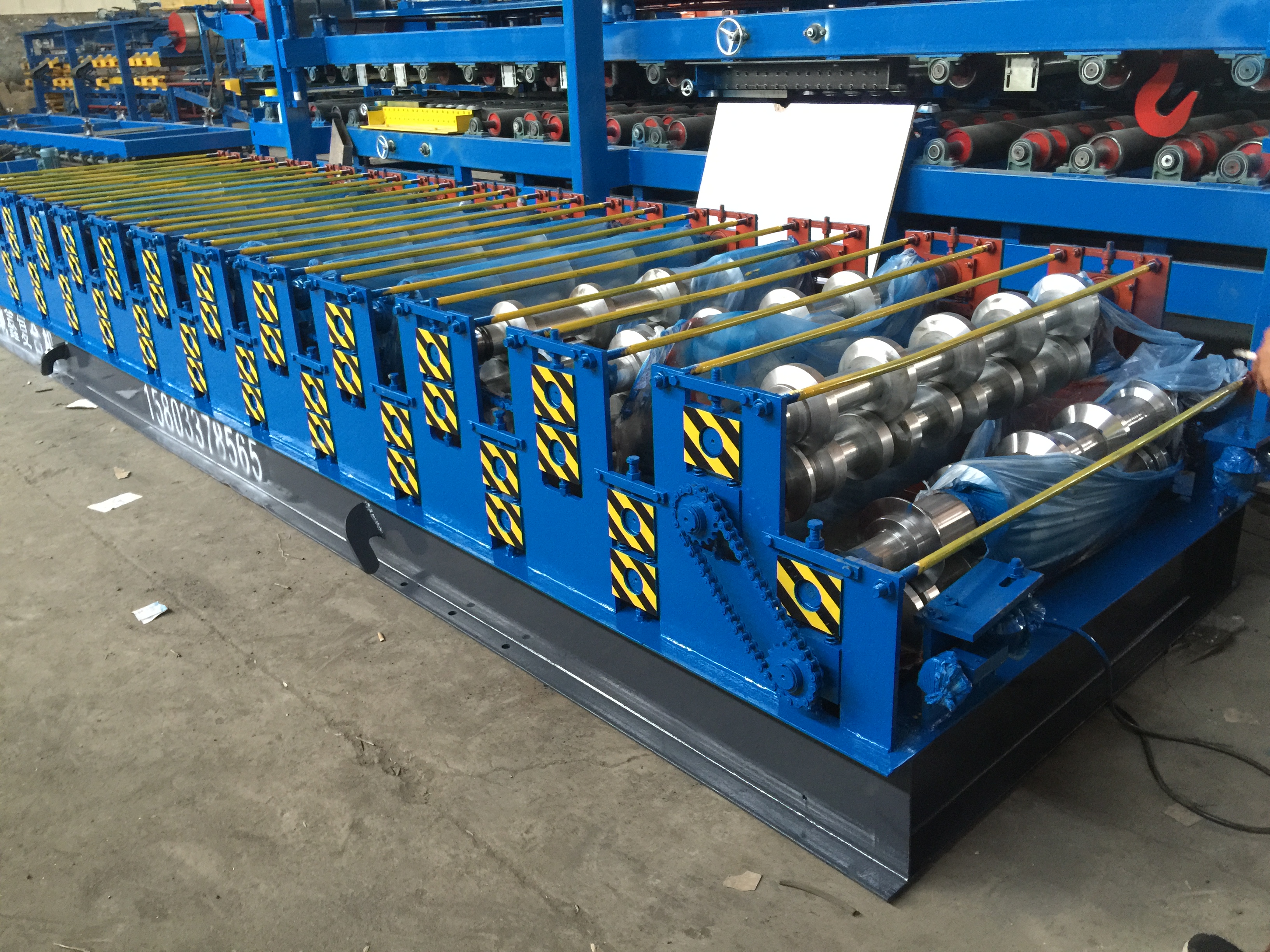 批發(fā)全自動(dòng)泡沫復(fù)合板彩鋼瓦壓瓦機(jī)設(shè)備