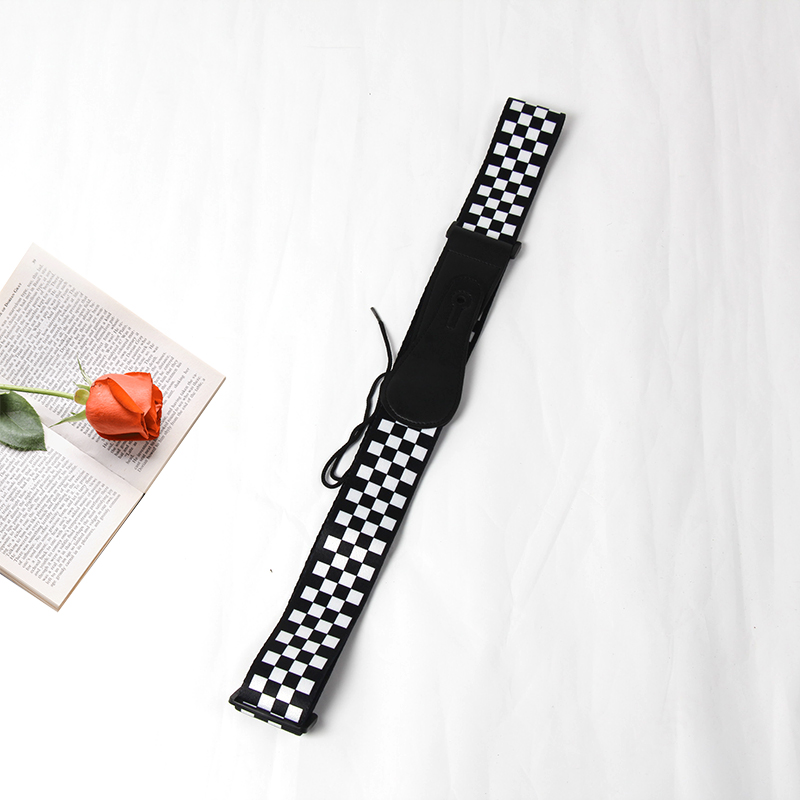 艾薇兒格子背帶